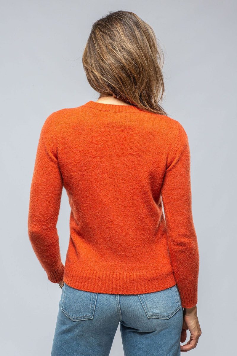 avant toi merit sweater in orange ladies sweaters axels vail 39443443220714